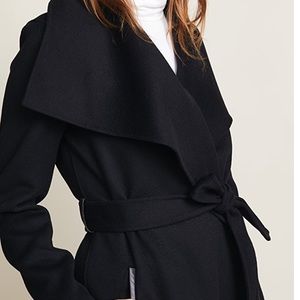 Meghan Markle’s favorite winter coat reversible Black wool gray wool classic